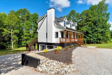 Welcome to this stunning brand new Kerr Lake home in the gated on Kerr Lake Country Club in North Carolina - for sale on GolfHomes.com, golf home, golf lot
