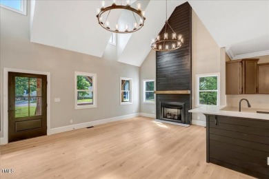 Welcome to this stunning brand new Kerr Lake home in the gated on Kerr Lake Country Club in North Carolina - for sale on GolfHomes.com, golf home, golf lot