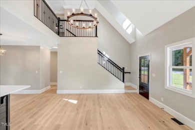 Welcome to this stunning brand new Kerr Lake home in the gated on Kerr Lake Country Club in North Carolina - for sale on GolfHomes.com, golf home, golf lot