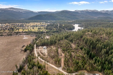 Wind through gorgeous terrain to reach ''forever views'' perched on Stoneridge Golf Club in Idaho - for sale on GolfHomes.com, golf home, golf lot