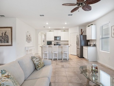 Charming 4BR/2BA home in a gated community where nature meets on Sandridge Golf Course and Club in Florida - for sale on GolfHomes.com, golf home, golf lot