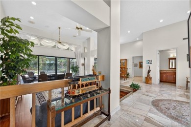 Spectacular location with stunning panoramic golf and water on Pipers Landing Country Club in Florida - for sale on GolfHomes.com, golf home, golf lot