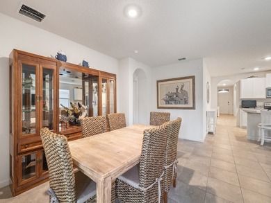 Charming 4BR/2BA home in a gated community where nature meets on Sandridge Golf Course and Club in Florida - for sale on GolfHomes.com, golf home, golf lot