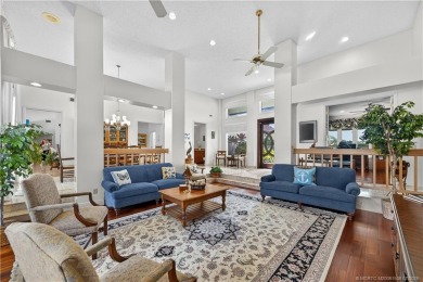 Spectacular location with stunning panoramic golf and water on Pipers Landing Country Club in Florida - for sale on GolfHomes.com, golf home, golf lot