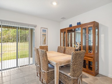 Charming 4BR/2BA home in a gated community where nature meets on Sandridge Golf Course and Club in Florida - for sale on GolfHomes.com, golf home, golf lot