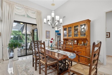 Spectacular location with stunning panoramic golf and water on Pipers Landing Country Club in Florida - for sale on GolfHomes.com, golf home, golf lot