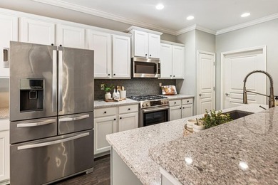 There's something immediately comforting about 5960 Chimney Rock on Reunion Golf Club in Georgia - for sale on GolfHomes.com, golf home, golf lot