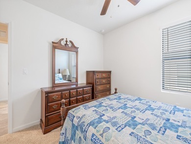 Charming 4BR/2BA home in a gated community where nature meets on Sandridge Golf Course and Club in Florida - for sale on GolfHomes.com, golf home, golf lot