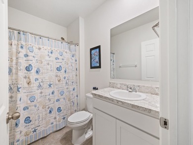 Charming 4BR/2BA home in a gated community where nature meets on Sandridge Golf Course and Club in Florida - for sale on GolfHomes.com, golf home, golf lot