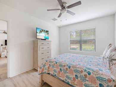 Charming 4BR/2BA home in a gated community where nature meets on Sandridge Golf Course and Club in Florida - for sale on GolfHomes.com, golf home, golf lot