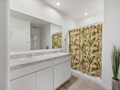 Charming 4BR/2BA home in a gated community where nature meets on Sandridge Golf Course and Club in Florida - for sale on GolfHomes.com, golf home, golf lot