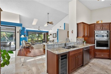 Spectacular location with stunning panoramic golf and water on Pipers Landing Country Club in Florida - for sale on GolfHomes.com, golf home, golf lot