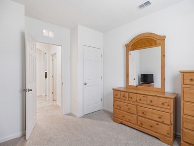 Charming 4BR/2BA home in a gated community where nature meets on Sandridge Golf Course and Club in Florida - for sale on GolfHomes.com, golf home, golf lot