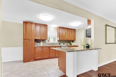 CHARMING TRADITIONAL BRICK HOME WITH STUNNING GOLF COURSE VIEWS! on Hide-A-Way Lake Golf Course in Texas - for sale on GolfHomes.com, golf home, golf lot