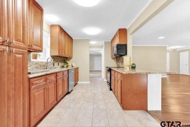 CHARMING TRADITIONAL BRICK HOME WITH STUNNING GOLF COURSE VIEWS! on Hide-A-Way Lake Golf Course in Texas - for sale on GolfHomes.com, golf home, golf lot