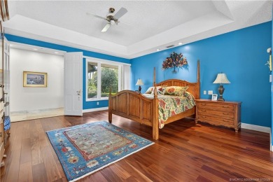 Spectacular location with stunning panoramic golf and water on Pipers Landing Country Club in Florida - for sale on GolfHomes.com, golf home, golf lot