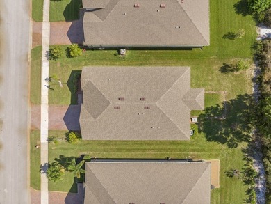 Charming 4BR/2BA home in a gated community where nature meets on Sandridge Golf Course and Club in Florida - for sale on GolfHomes.com, golf home, golf lot