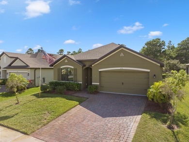 Charming 4BR/2BA home in a gated community where nature meets on Sandridge Golf Course and Club in Florida - for sale on GolfHomes.com, golf home, golf lot