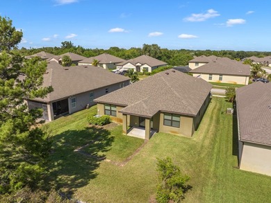 Charming 4BR/2BA home in a gated community where nature meets on Sandridge Golf Course and Club in Florida - for sale on GolfHomes.com, golf home, golf lot