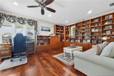 Spectacular location with stunning panoramic golf and water on Pipers Landing Country Club in Florida - for sale on GolfHomes.com, golf home, golf lot