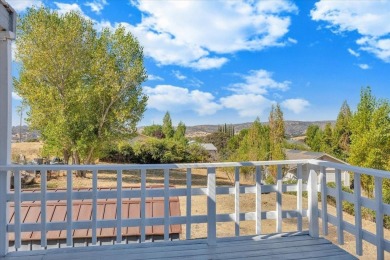 Discover a slice of vintage charm in this affordable barn-style on The Club at Copper Valley Golf Course in California - for sale on GolfHomes.com, golf home, golf lot