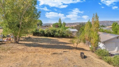 Discover a slice of vintage charm in this affordable barn-style on The Club at Copper Valley Golf Course in California - for sale on GolfHomes.com, golf home, golf lot