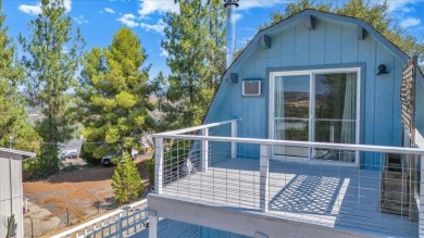 Discover a slice of vintage charm in this affordable barn-style on The Club at Copper Valley Golf Course in California - for sale on GolfHomes.com, golf home, golf lot