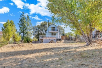 Discover a slice of vintage charm in this affordable barn-style on The Club at Copper Valley Golf Course in California - for sale on GolfHomes.com, golf home, golf lot