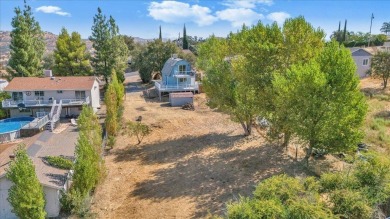 Discover a slice of vintage charm in this affordable barn-style on The Club at Copper Valley Golf Course in California - for sale on GolfHomes.com, golf home, golf lot