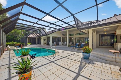 Spectacular location with stunning panoramic golf and water on Pipers Landing Country Club in Florida - for sale on GolfHomes.com, golf home, golf lot