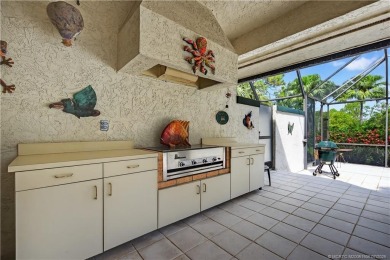 Spectacular location with stunning panoramic golf and water on Pipers Landing Country Club in Florida - for sale on GolfHomes.com, golf home, golf lot