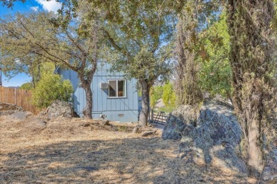 Discover a slice of vintage charm in this affordable barn-style on The Club at Copper Valley Golf Course in California - for sale on GolfHomes.com, golf home, golf lot