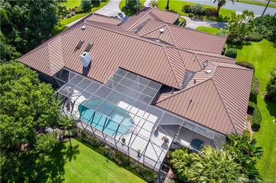 Spectacular location with stunning panoramic golf and water on Pipers Landing Country Club in Florida - for sale on GolfHomes.com, golf home, golf lot