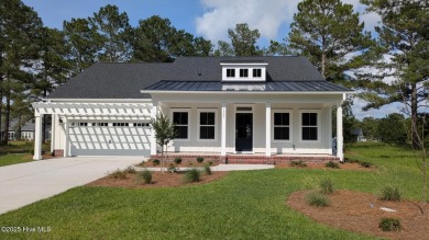 Discover the charm of the Capeside-- a 3-bed, 3-bath coastal on Sea Trail Golf Resort in North Carolina - for sale on GolfHomes.com, golf home, golf lot