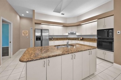 Look forward to coming home! Live on a quiet street in Eastlake on East Lake Woodlands Country Club in Florida - for sale on GolfHomes.com, golf home, golf lot