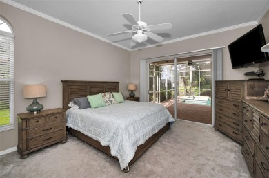 Look forward to coming home! Live on a quiet street in Eastlake on East Lake Woodlands Country Club in Florida - for sale on GolfHomes.com, golf home, golf lot