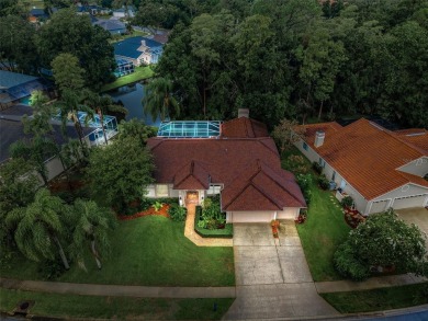 Look forward to coming home! Live on a quiet street in Eastlake on East Lake Woodlands Country Club in Florida - for sale on GolfHomes.com, golf home, golf lot