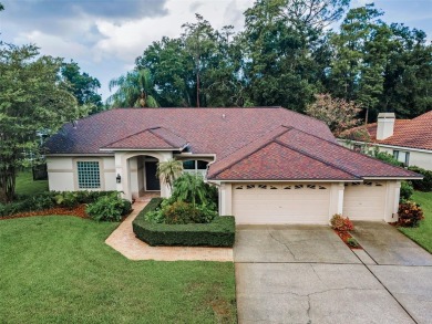 Look forward to coming home! Live on a quiet street in Eastlake on East Lake Woodlands Country Club in Florida - for sale on GolfHomes.com, golf home, golf lot