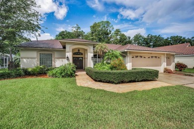 Look forward to coming home! Live on a quiet street in Eastlake on East Lake Woodlands Country Club in Florida - for sale on GolfHomes.com, golf home, golf lot