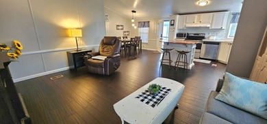 Furnished, spacious 2 bedroom 2 bath home in 55 + Resort style on Zephyrhills Municipal Golf Course in Florida - for sale on GolfHomes.com, golf home, golf lot