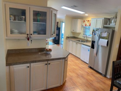 This floor plan is one of the best in a 2 bedroom/2 bathroom on Southport Springs Golf Club in Florida - for sale on GolfHomes.com, golf home, golf lot