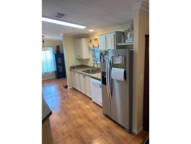 This floor plan is one of the best in a 2 bedroom/2 bathroom on Southport Springs Golf Club in Florida - for sale on GolfHomes.com, golf home, golf lot