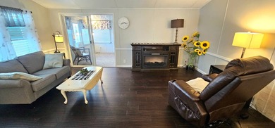 Furnished, spacious 2 bedroom 2 bath home in 55 + Resort style on Zephyrhills Municipal Golf Course in Florida - for sale on GolfHomes.com, golf home, golf lot