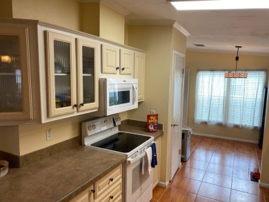 This floor plan is one of the best in a 2 bedroom/2 bathroom on Southport Springs Golf Club in Florida - for sale on GolfHomes.com, golf home, golf lot