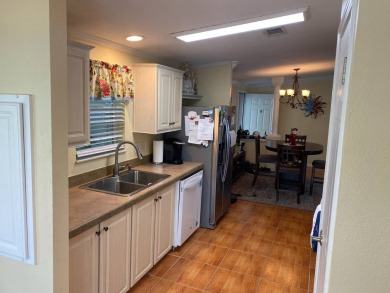 This floor plan is one of the best in a 2 bedroom/2 bathroom on Southport Springs Golf Club in Florida - for sale on GolfHomes.com, golf home, golf lot