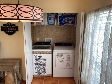 This floor plan is one of the best in a 2 bedroom/2 bathroom on Southport Springs Golf Club in Florida - for sale on GolfHomes.com, golf home, golf lot
