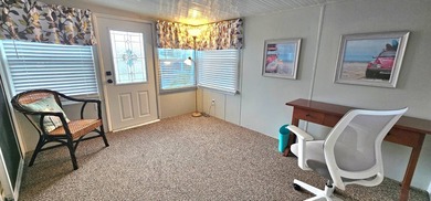 Furnished, spacious 2 bedroom 2 bath home in 55 + Resort style on Zephyrhills Municipal Golf Course in Florida - for sale on GolfHomes.com, golf home, golf lot