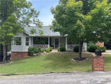This beautifully updated and maintained 3-bedroom, 2  1/2  -bath on Holiday Island Executive Golf Course in Arkansas - for sale on GolfHomes.com, golf home, golf lot