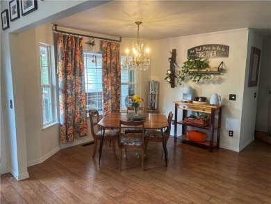 This beautifully updated and maintained 3-bedroom, 2  1/2  -bath on Holiday Island Executive Golf Course in Arkansas - for sale on GolfHomes.com, golf home, golf lot