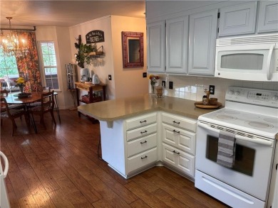 This beautifully updated and maintained 3-bedroom, 2  1/2  -bath on Holiday Island Executive Golf Course in Arkansas - for sale on GolfHomes.com, golf home, golf lot